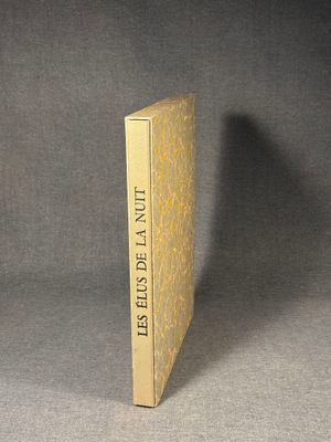 a yellow book that is sitting on a table