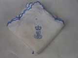 a napkin with a crown on it on a table