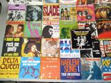 a table with a bunch of different records on it