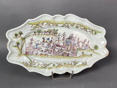une image représentant une assiette sur laquelle figure l'illustration d'un bateau