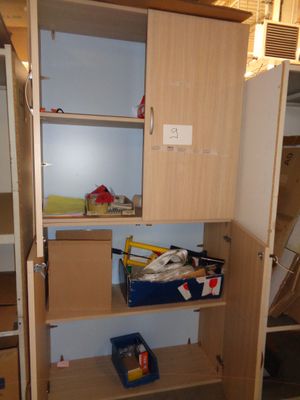 a closet with a lot of clutter in it