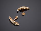 a pair of yellow gold earrings with diamonds