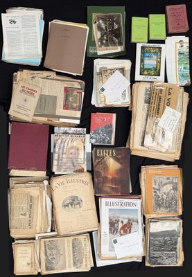 many old books on a table with a black background
