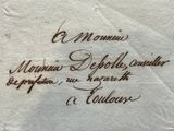 a close up of a piece of paper with writing on it