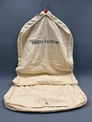 Valise Louis Vuitton en toile beige avec logo noir