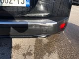 a close up of a car with a license plate on the back of it