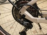 a close up of a bicycle with a chain on the front wheel