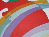 the cover of a book with a picture of a rainbow colored wave on it