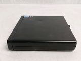 an image of a black dvd player sitting on a white surface