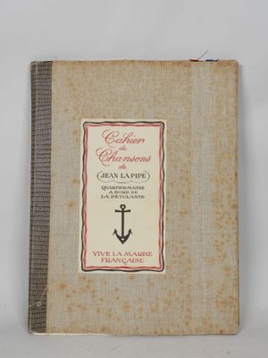an old book with a picture of an anchor on it
