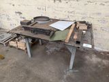 a table that has a lot of tools on it