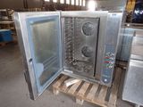 a large oven that is sitting on a pallet in a warehouse