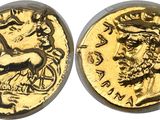 a gold coin with an image of a man on it
