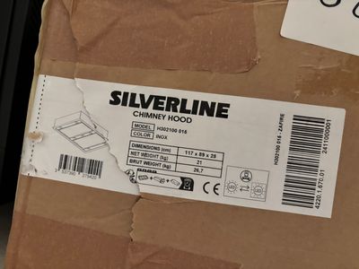 a box of silverline dinner hoods sitting on a table