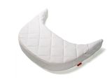a close up of a white baby seat on a white background
