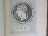 an open book with a drawing of a man in a headdress