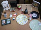 a wooden table with various items on it and a clock