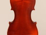 an old violin with a wooden back and a long neck