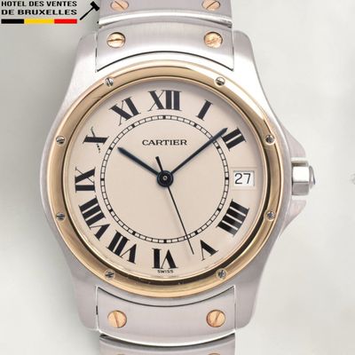 an image of a close up of a wrist watch with roman numerals