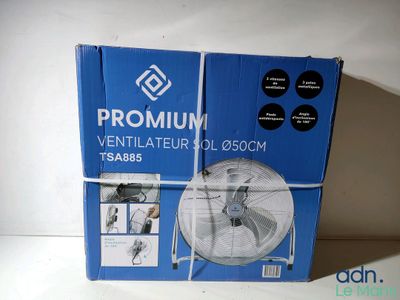 le boîtier d'un ventilateur est posé sur une table