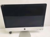 an apple desktop computer sitting on top of a white table