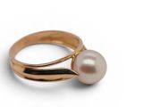 an image of a gold ring with a pearl on it