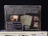 a box with a card game inside of it on a table