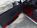 an image of a car with the door open
