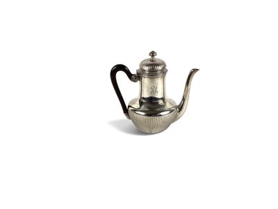 an antique silver teapot with a black handle on a white background