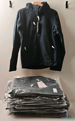 a pile of clothes on a table next to a jacket