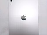 a close up of an apple ipad on a white surface
