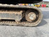 an image of a close up of a tractor tracks