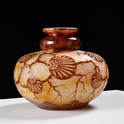 a vase that is sitting on a white table