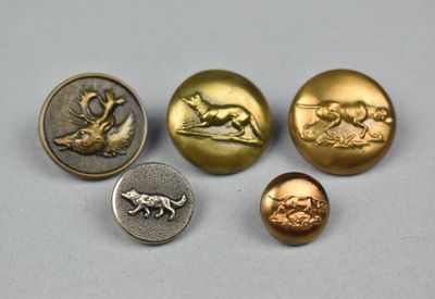 quatre types de boutons différents sur un fond blanc