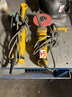 two tools that are sitting on top of a table