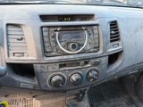 a dashboard of a car with a clock on it