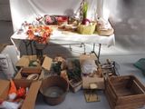 many boxes of food sitting on a table in a room