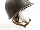 an old helmet on a mannequin head on a white surface