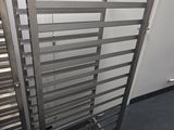 a metal rack that has a bunch of racks on it