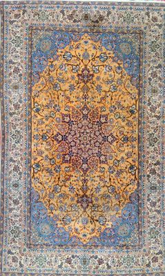an oriental rug with a medallion design on a blue ground