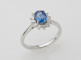 an oval blue sapphire and diamond ring