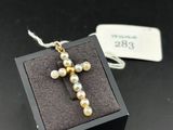 a close up of a small box with a cross on it