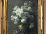 an oil painting of a vase of white flowers on a table