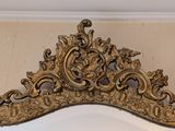 a mirror that is hanging on the wall in the room