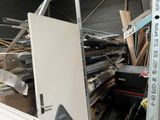 a picture of a pile of junk in a warehouse