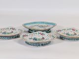 six pieces of chinese porcelain dishes on a white surface
