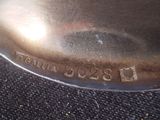 a close up of a metal object on a table
