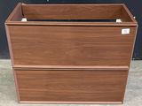 a wooden box that has two drawers on it