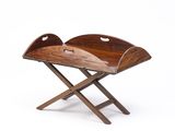 a wooden tray with two wooden legs and a wooden tray on top of it