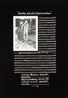 a black and white photo of a man standing in a room
